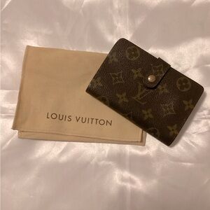 Luis Vuitton Monogram Kiss lock Wallet Used condition some peeling, & spot